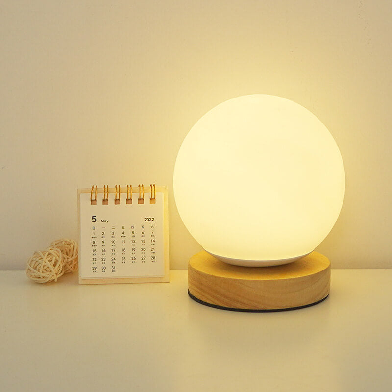 Nowoczesna minimalistyczna okrągła lampa biurkowa LED z możliwością ładowania przez USB
