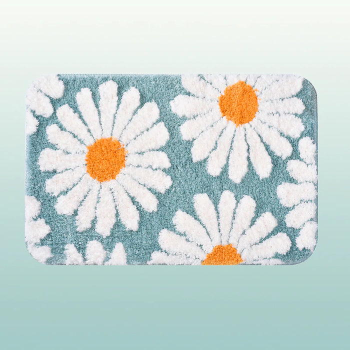 Dywanik łazienkowy Feblilac Sweet Daisy, fioletowy kwiat