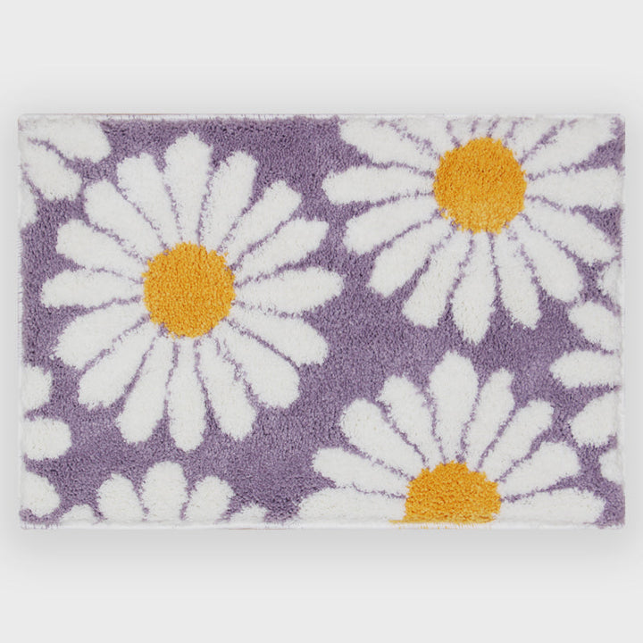 Dywanik łazienkowy Feblilac Sweet Daisy, fioletowy kwiat