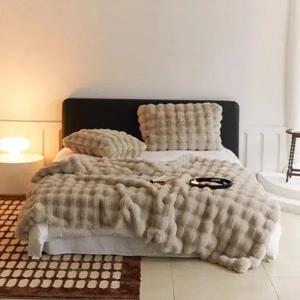 Koc Grzewczy - ciepły koc na zimę - sofa