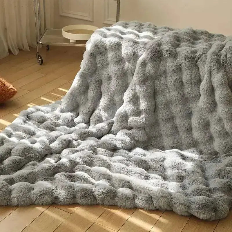 Koc Grzewczy - ciepły koc na zimę - sofa