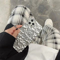 Etui na iPhone w wzór folii aluminiowej
