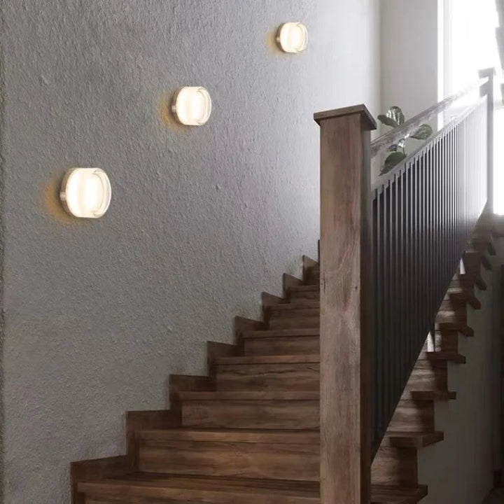 Nowoczesna okrągła lampa ścienna dla atmosferycznej elegancji