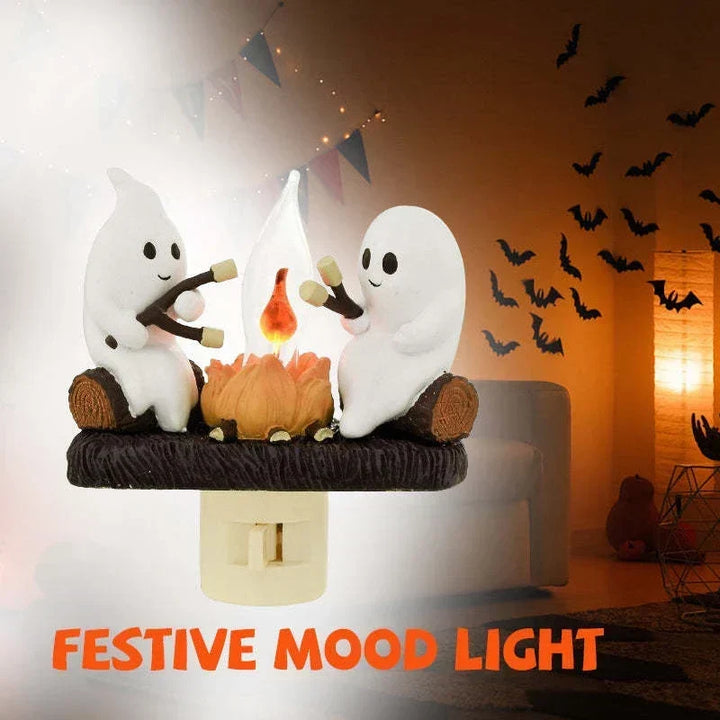 Lampka nocna z duchem przy ognisku
