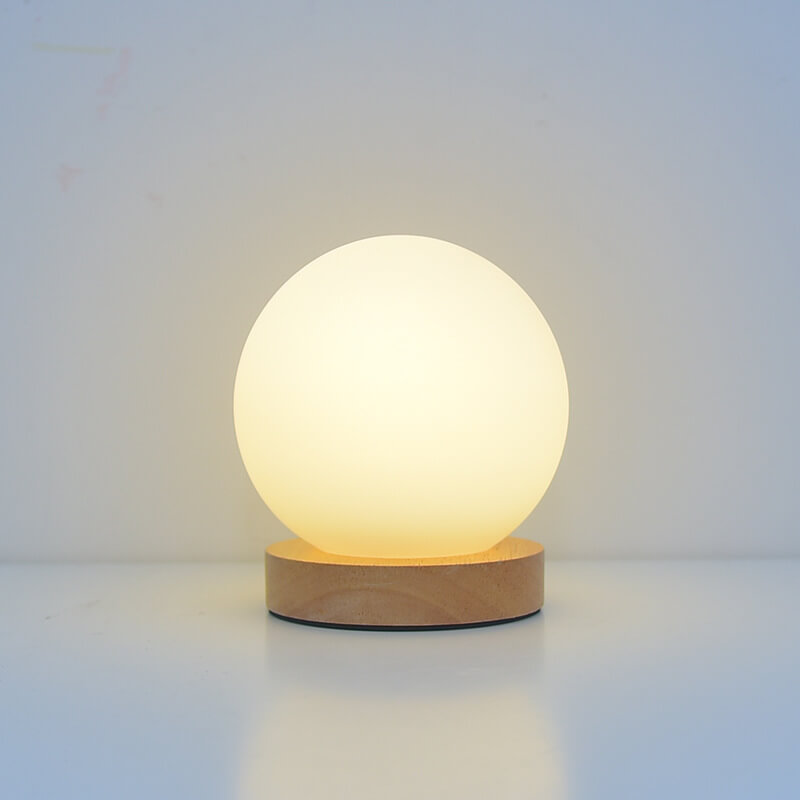 Nowoczesna minimalistyczna okrągła lampa biurkowa LED z możliwością ładowania przez USB