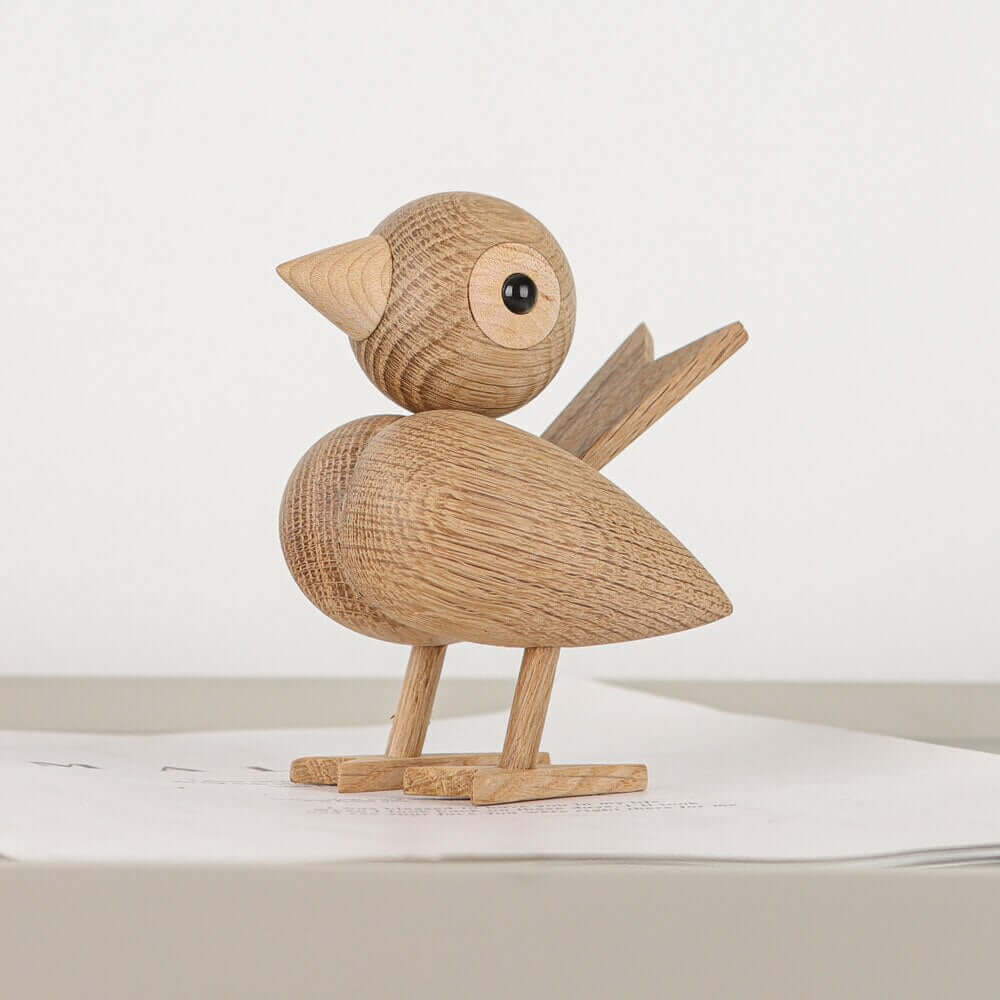 Mały ptaszek mi powiedział, nordycki drewniany ornament