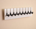 Ścienny wieszak na ubrania w kształcie klawiszy pianina z haczykami