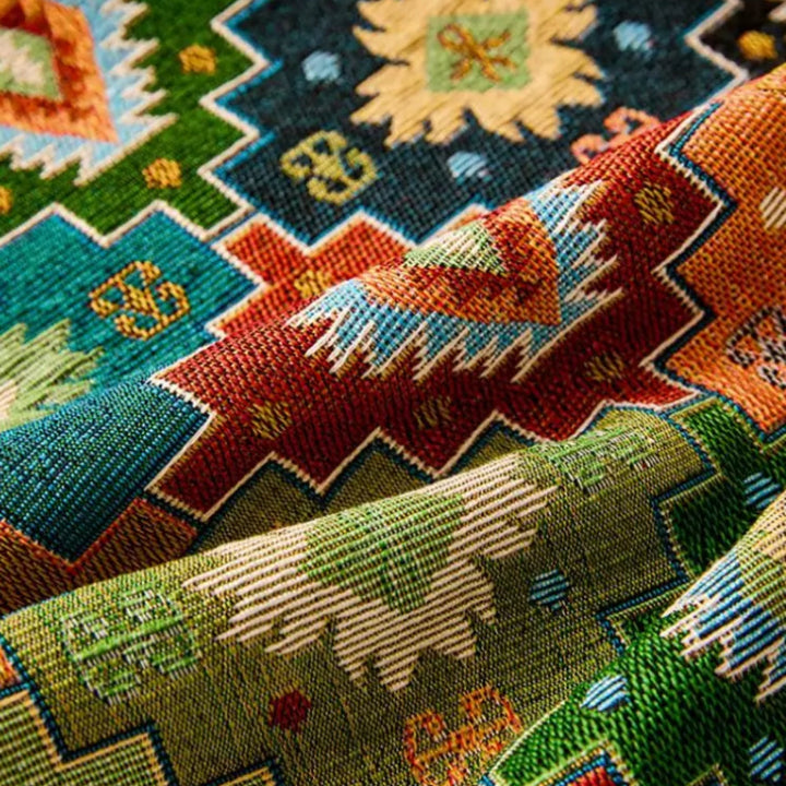 Pokrowiec na sofę w geometryczny wzór tribal Zahara