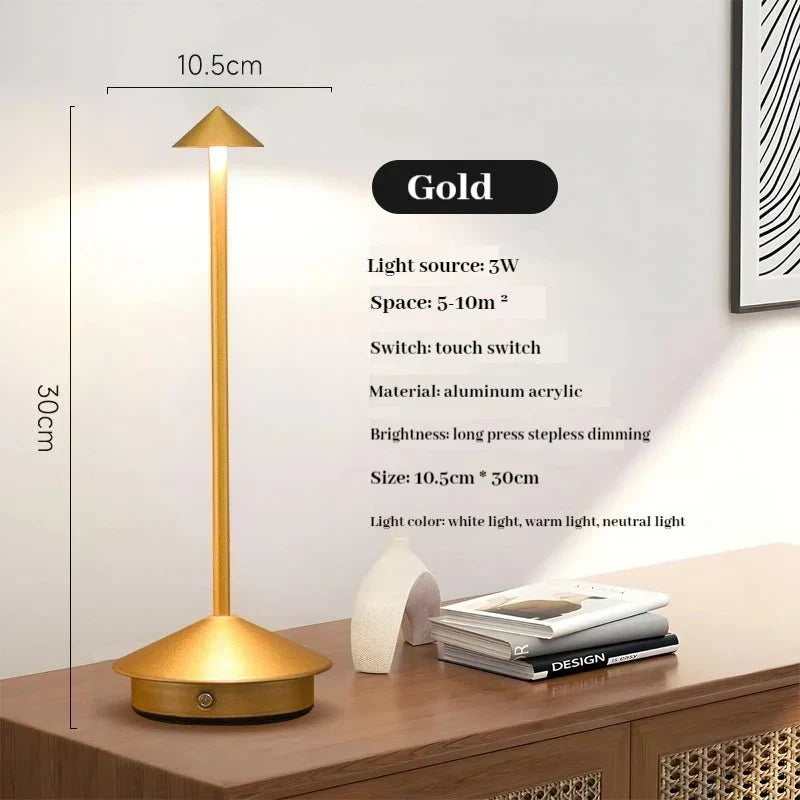 Elegancka, ładowana metalowa lampa stołowa