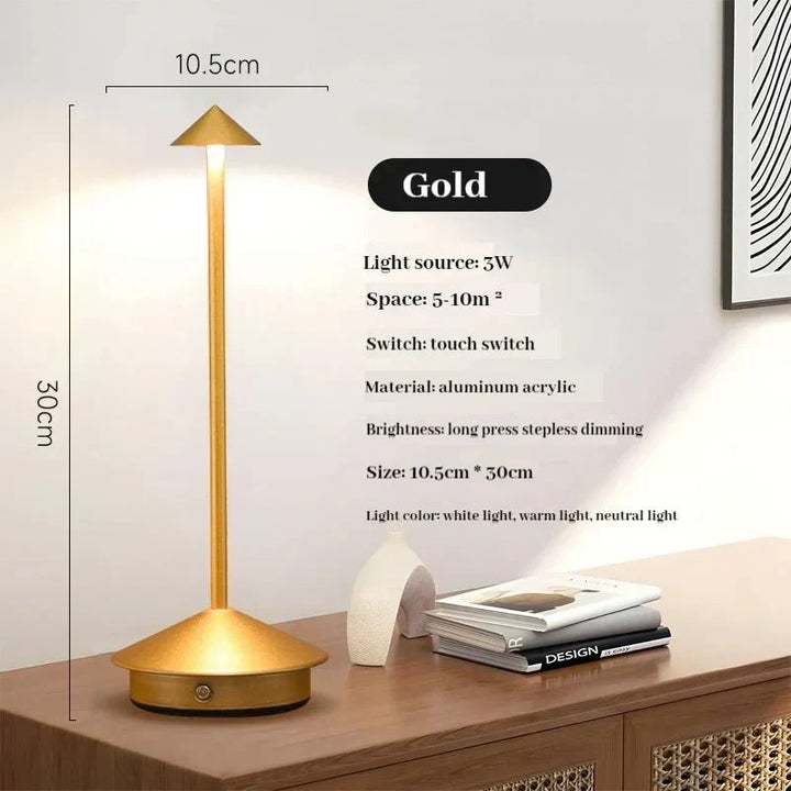 Elegancka, ładowana metalowa lampa stołowa